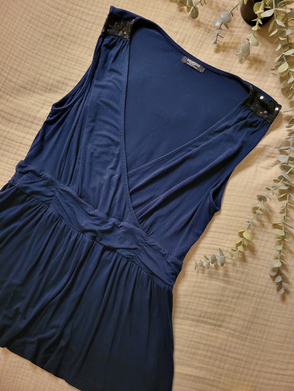 Navy Sleeveless Surplice Waist Knit Top